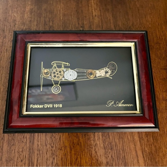 framed piece of art featuring a representation of an airplane with clock pieces - Picture 6 of 10